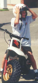 boy_helmet_moped.JPG (99712 bytes)