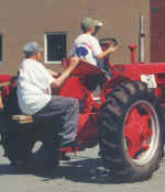 boy_man_case_tractor.JPG (63994 bytes)